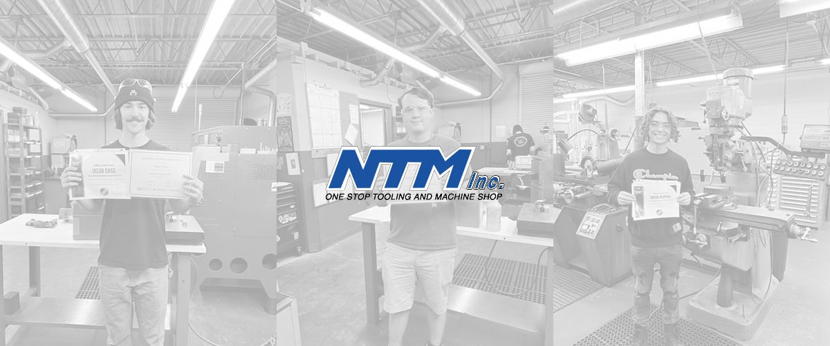 Ntm Employees Holding Up Work Certificates